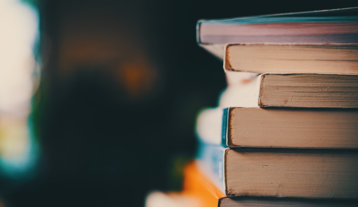 Large Stack of Colorful Books